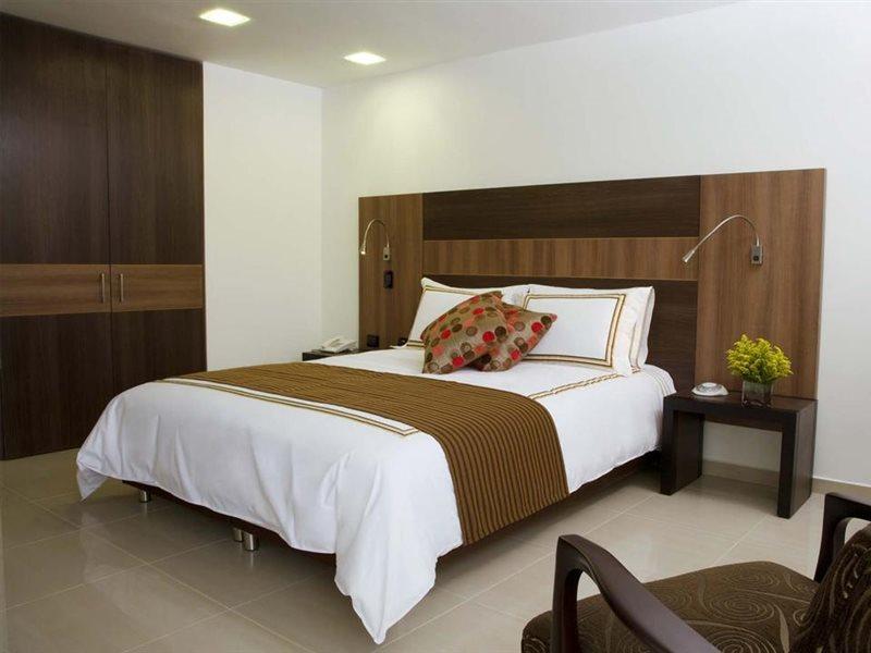 San Simon Hotel Pereira By Soratama Exterior photo A bedroom