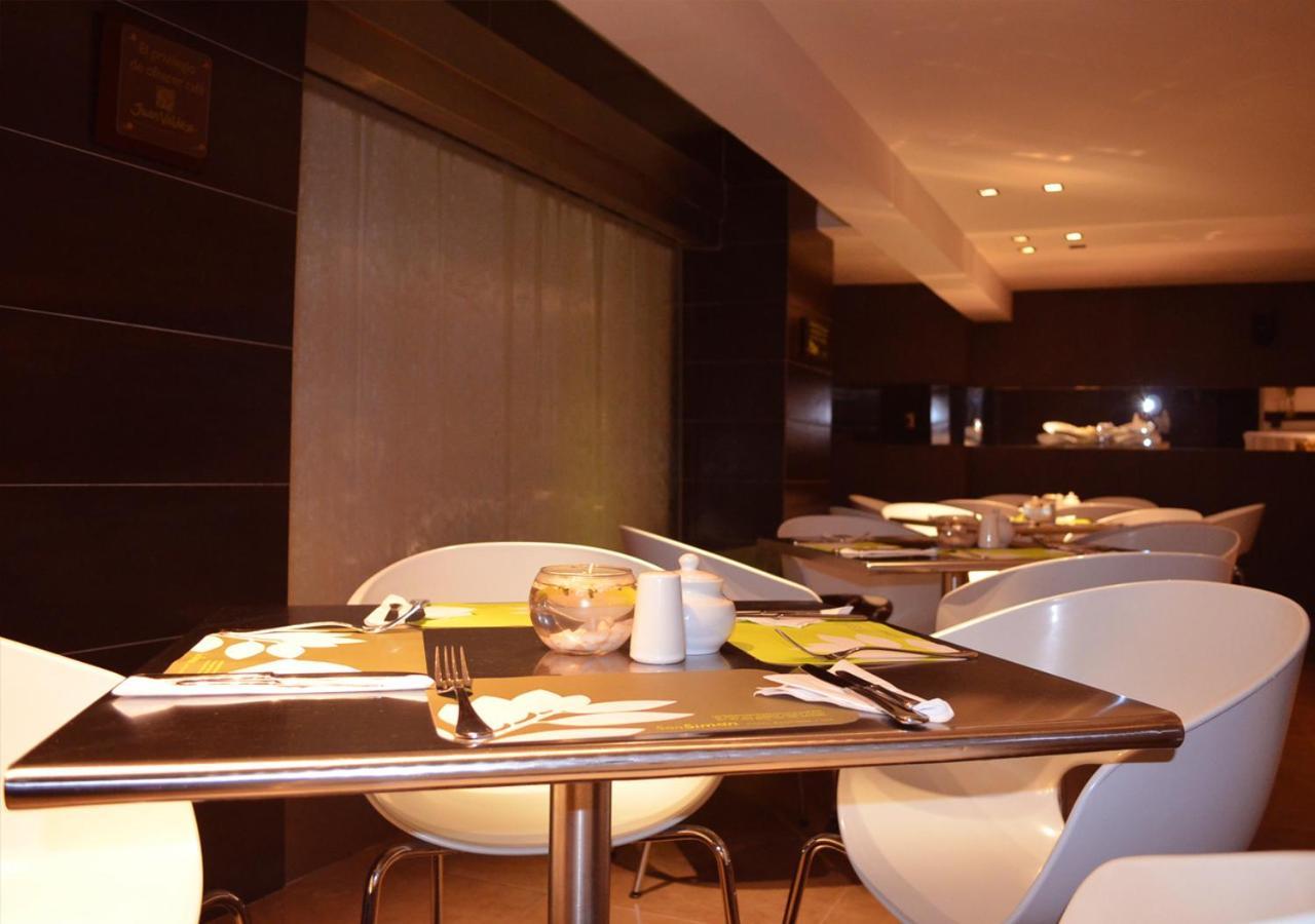 San Simon Hotel Pereira By Soratama Exterior photo The interior of the restaurant