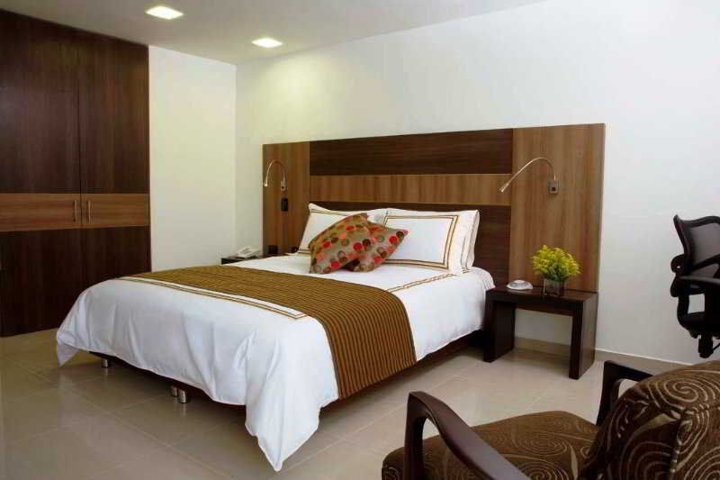San Simon Hotel Pereira By Soratama Exterior photo A bedroom